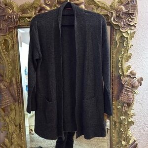 100% Cashmere shawl collar cardigan with pockets and side vents